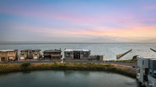 a view of boat and small yard