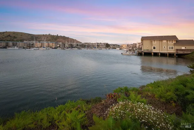 a view of a lake with houses