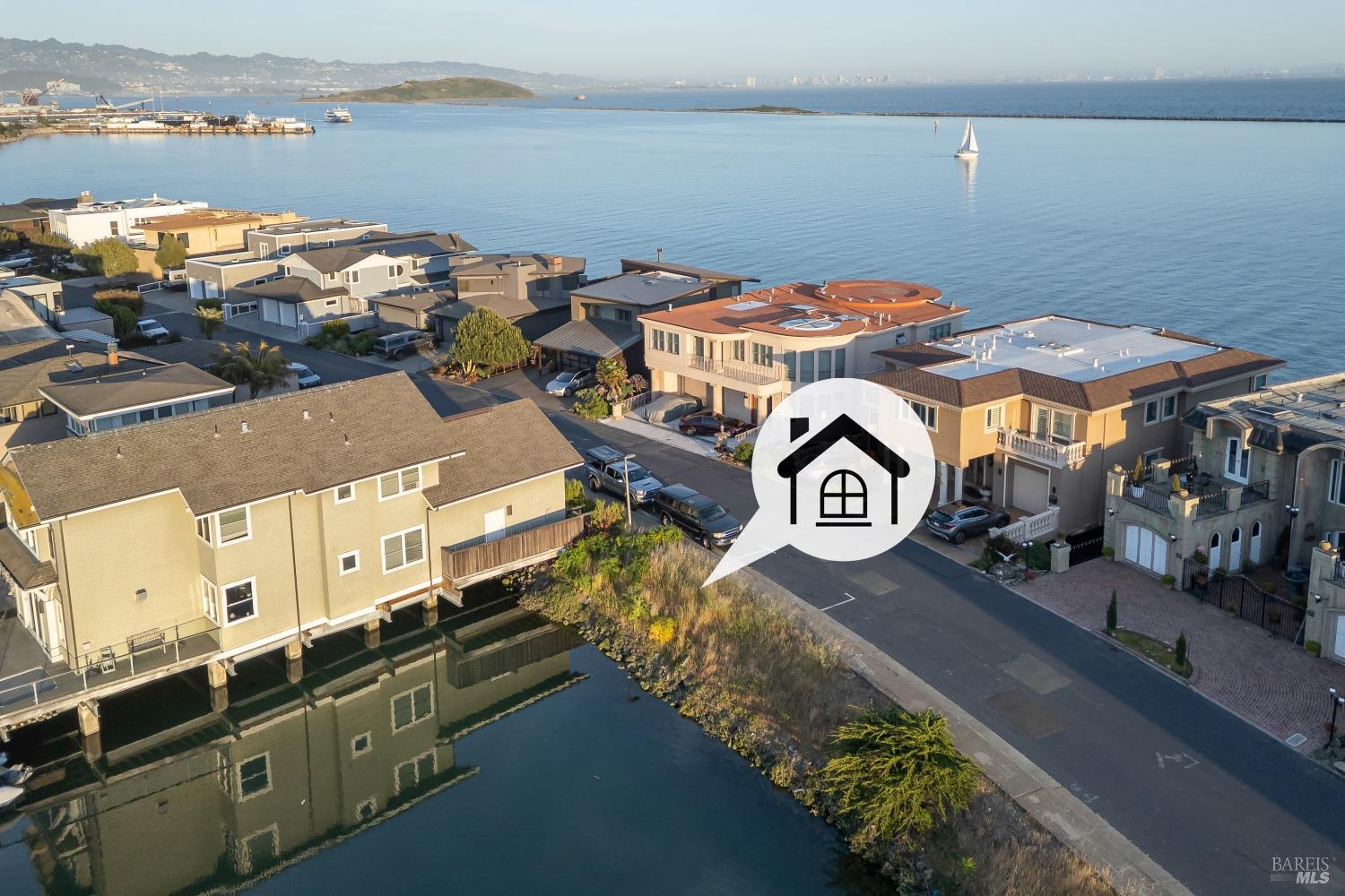 0 Sand Piper Spit Richmond, CA 94801 - Photo 6 of 32 a view of a lake with houses
