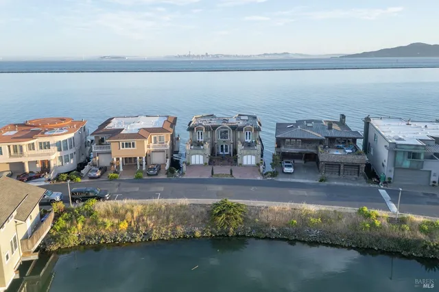 a view of a lake with a building in the background