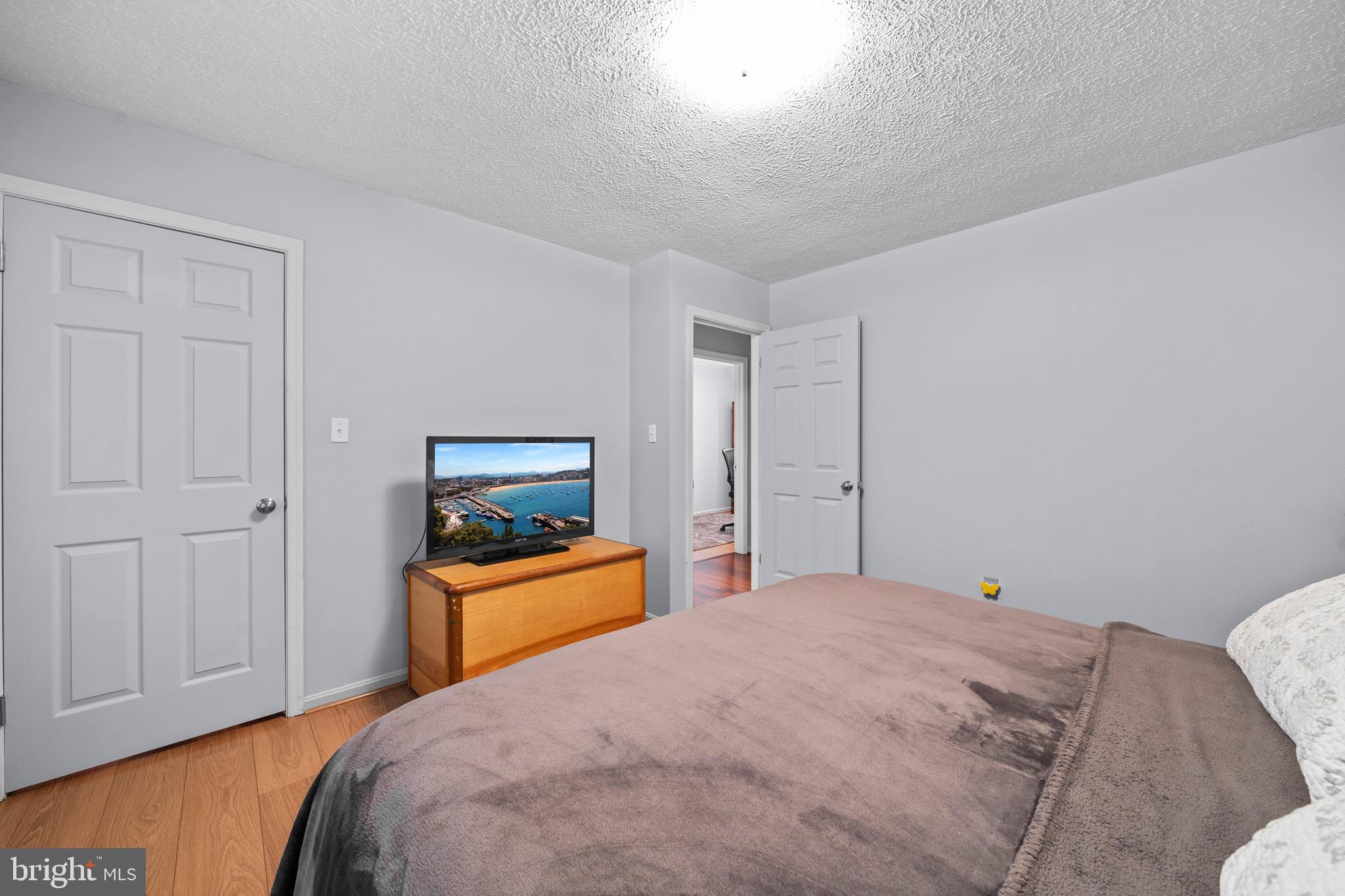 26599 Yowaiski Mill Road Mechanicsville, MD 20659 - Photo 27 of 58 a bedroom with a bed and dresser