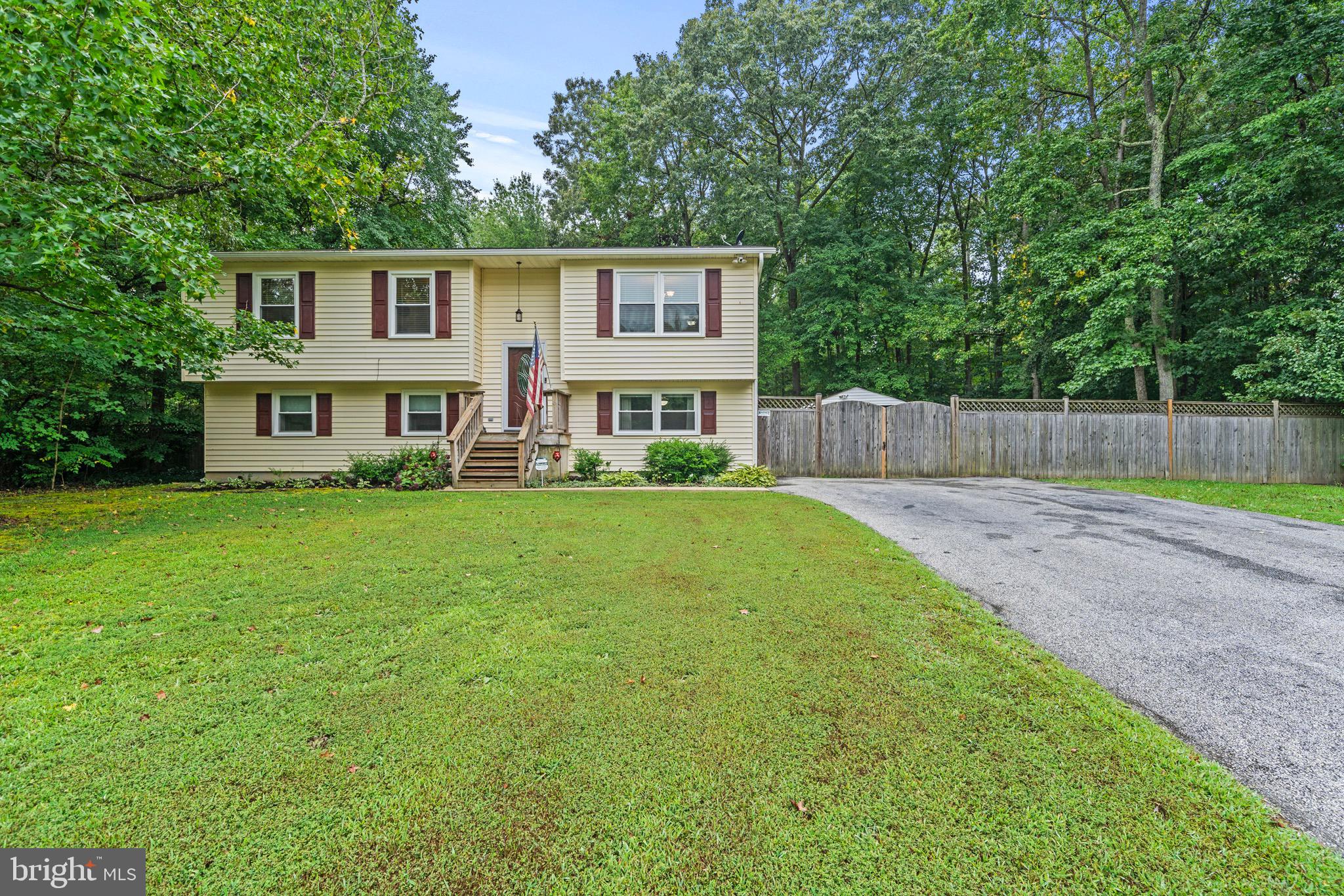 26599 Yowaiski Mill Road Mechanicsville, MD 20659 - Photo 3 of 58 a view of a house with a back yard
