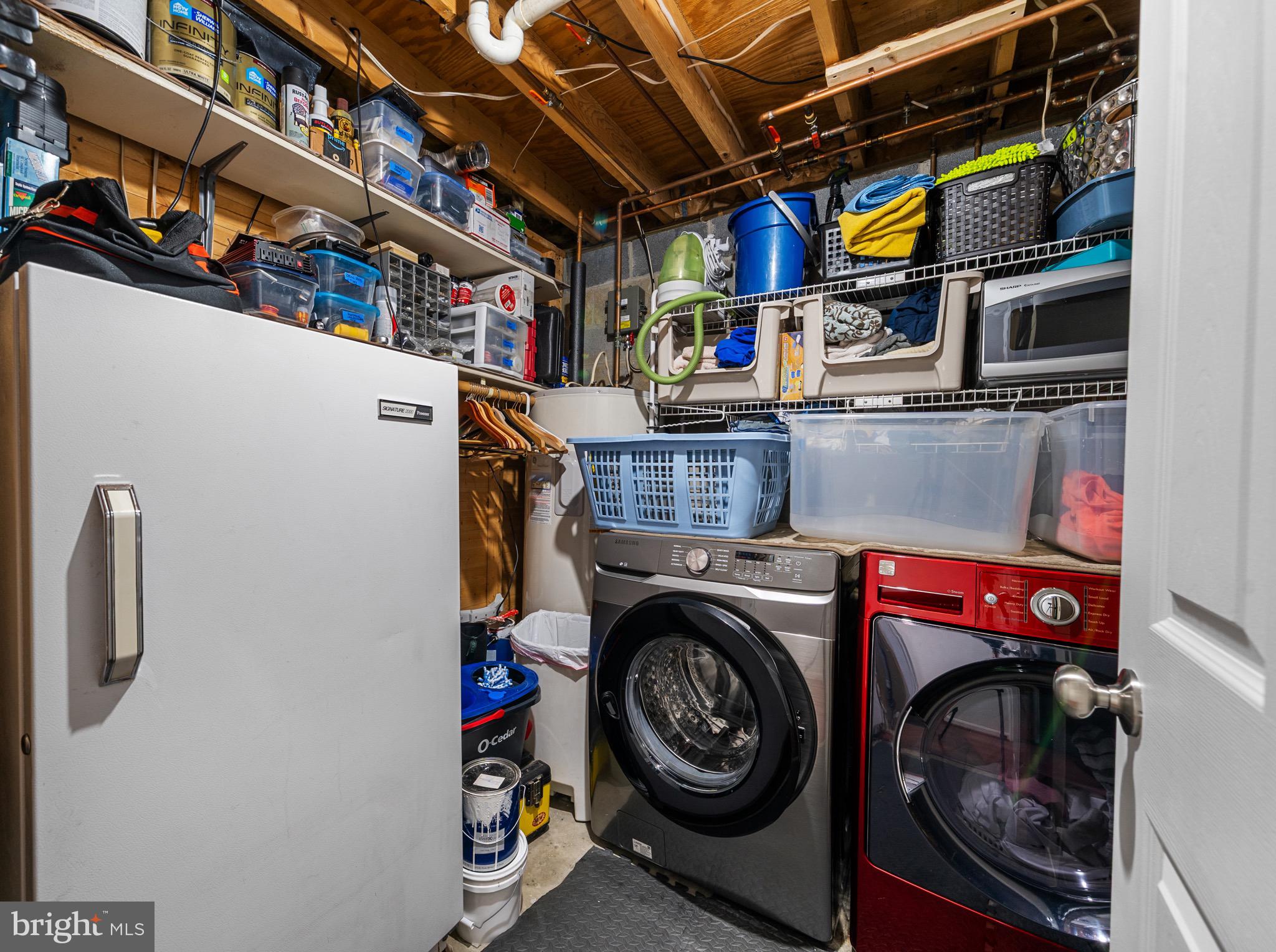 26599 Yowaiski Mill Road Mechanicsville, MD 20659 - Photo 44 of 58 a utility room with dryer and washer