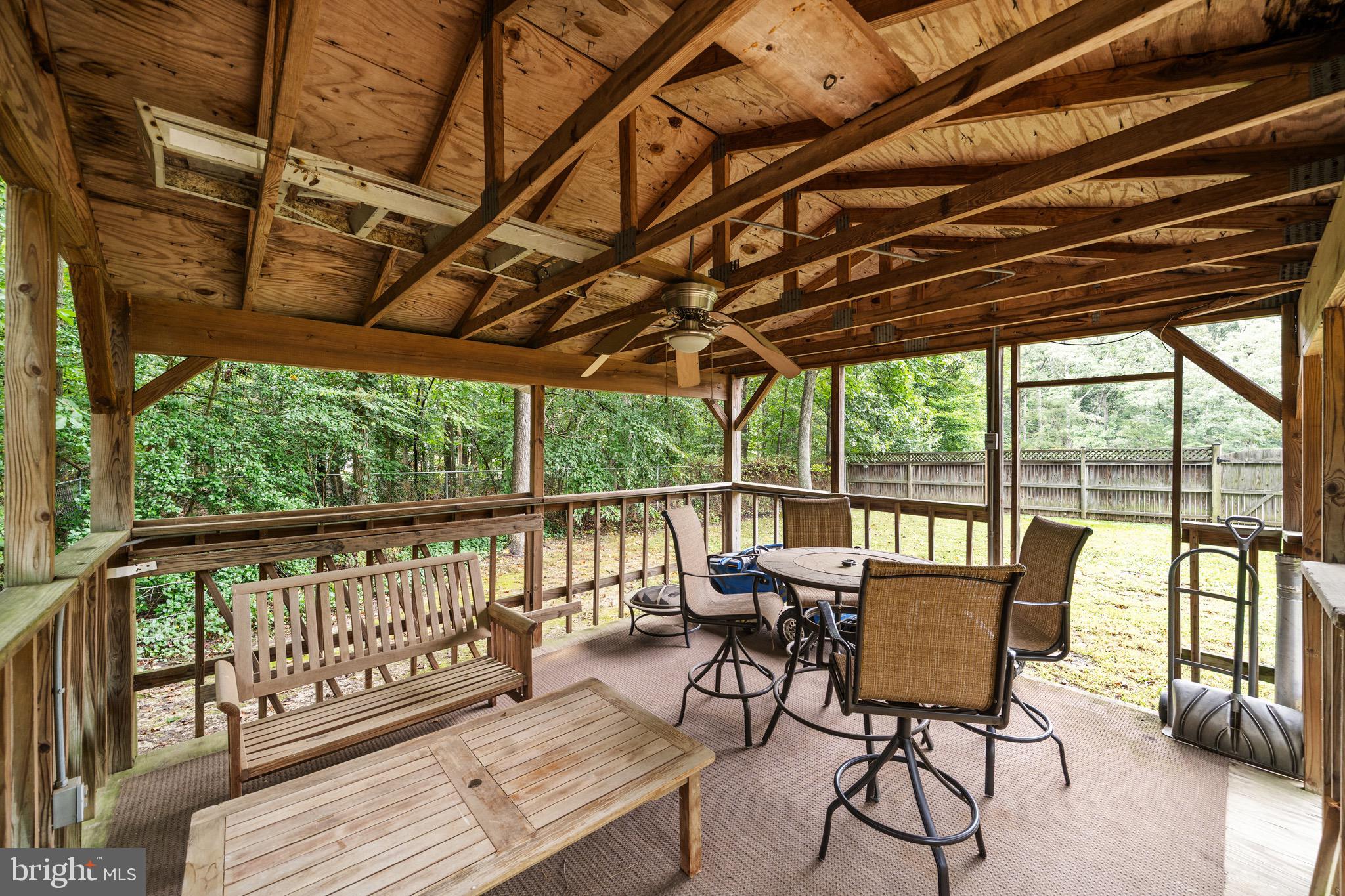 26599 Yowaiski Mill Road Mechanicsville, MD 20659 - Photo 48 of 58 a view of a chairs and table in the balcony