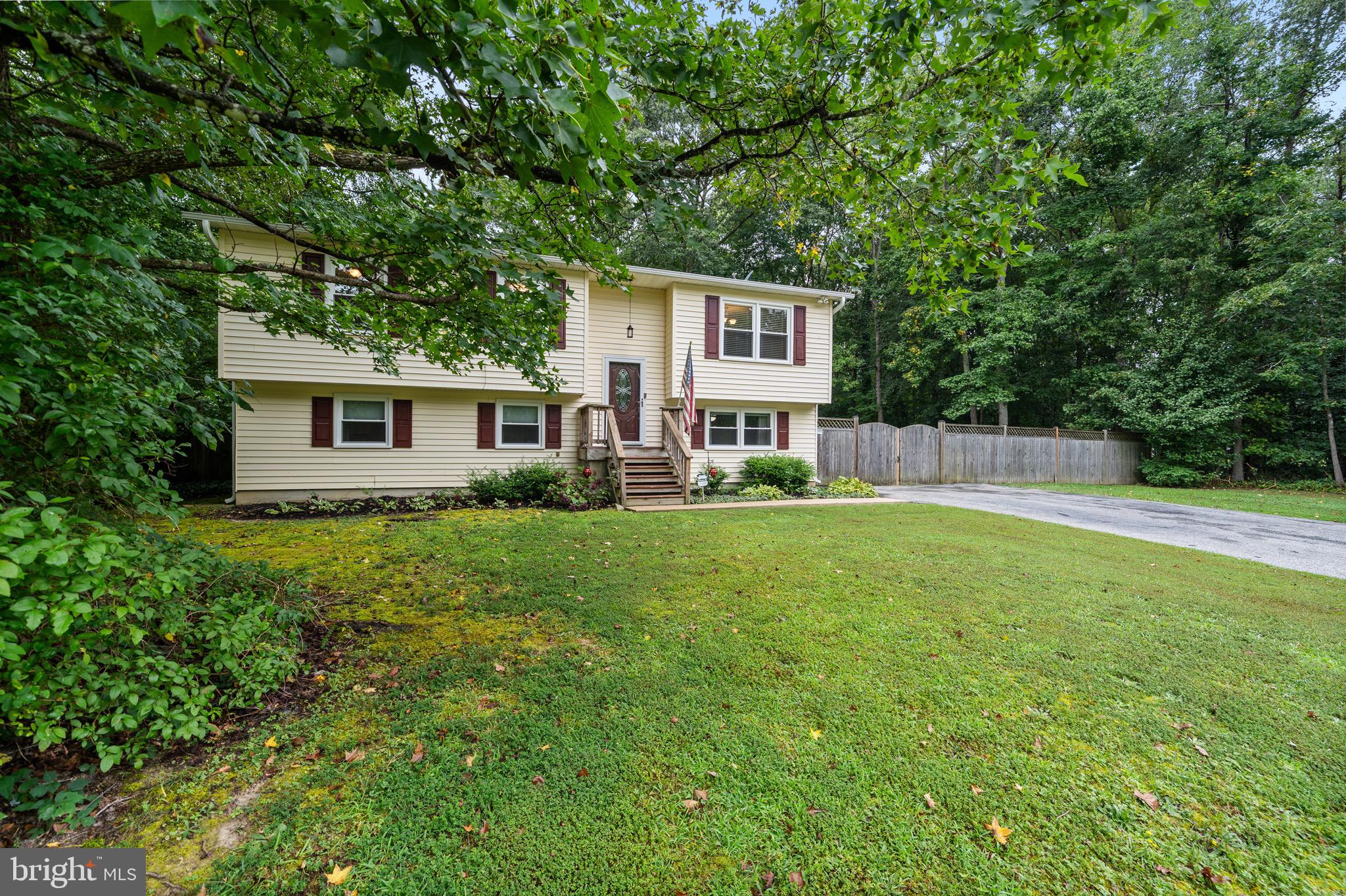 26599 Yowaiski Mill Road Mechanicsville, MD 20659 - Photo 5 of 58 a house view with a garden space