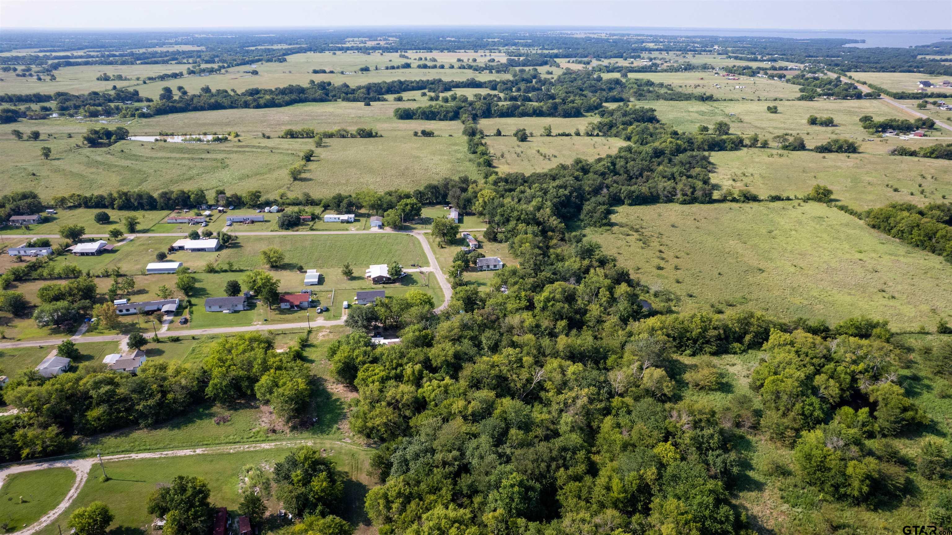 338 Roberts Road Point, TX 75472 - Photo 11 of 14 an aerial view of a houses with a yard