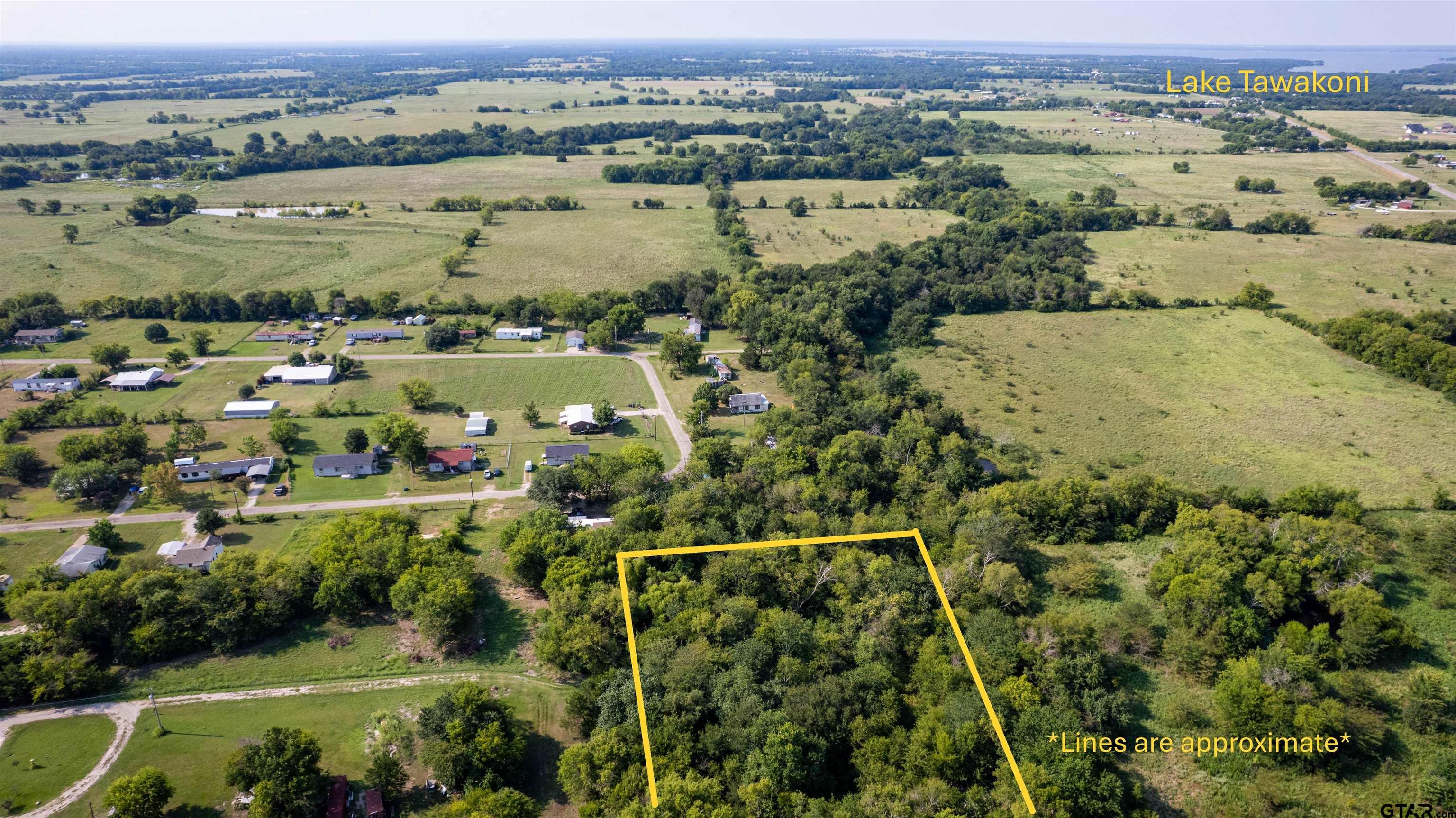 338 Roberts Road Point, TX 75472 - Photo 3 of 14 an aerial view of a houses with a yard