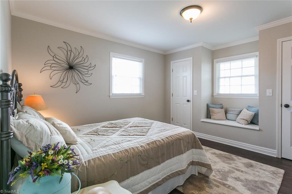 264 Welcome View Church Road Dobson, NC 27017 - Photo 15 of 30 Second bedroom along hallway features double closets and window seat overlooking the front yard.