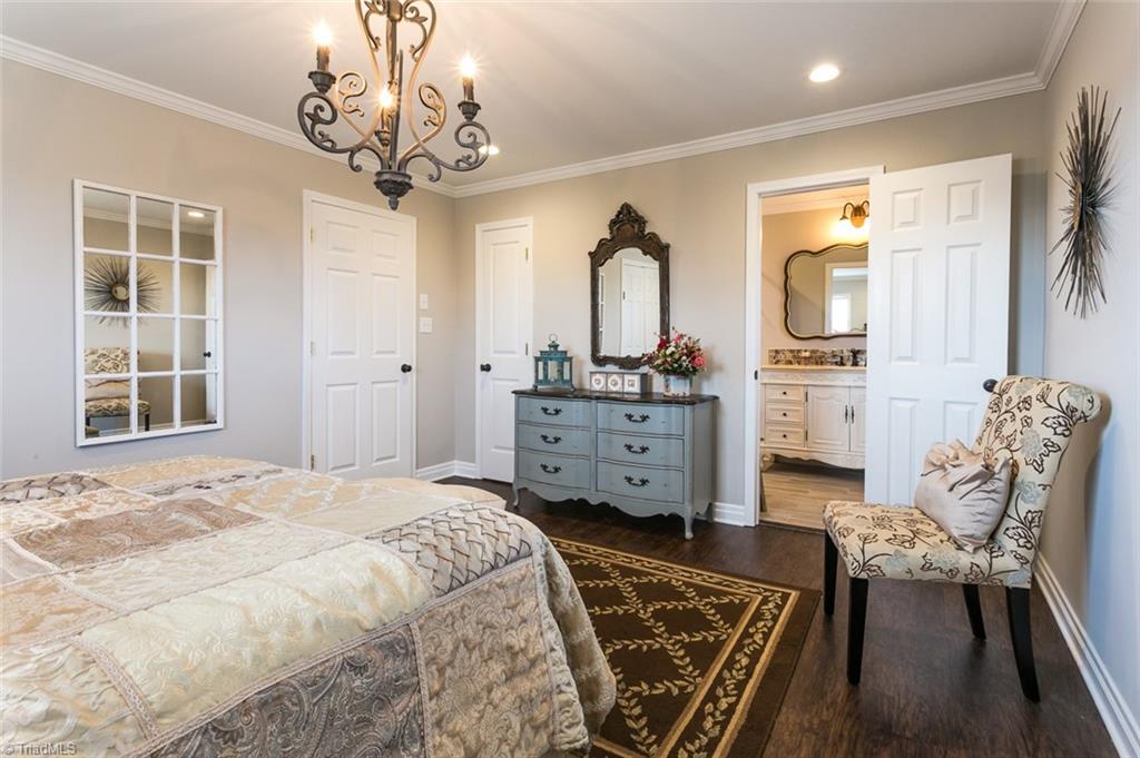 264 Welcome View Church Road Dobson, NC 27017 - Photo 16 of 30 The master bedroom can be found at the end of the hall and features private bath an two closets.