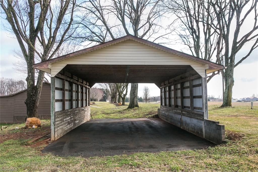 264 Welcome View Church Road Dobson, NC 27017 - Photo 21 of 30 This storage shed is idea for an RV or boat.
