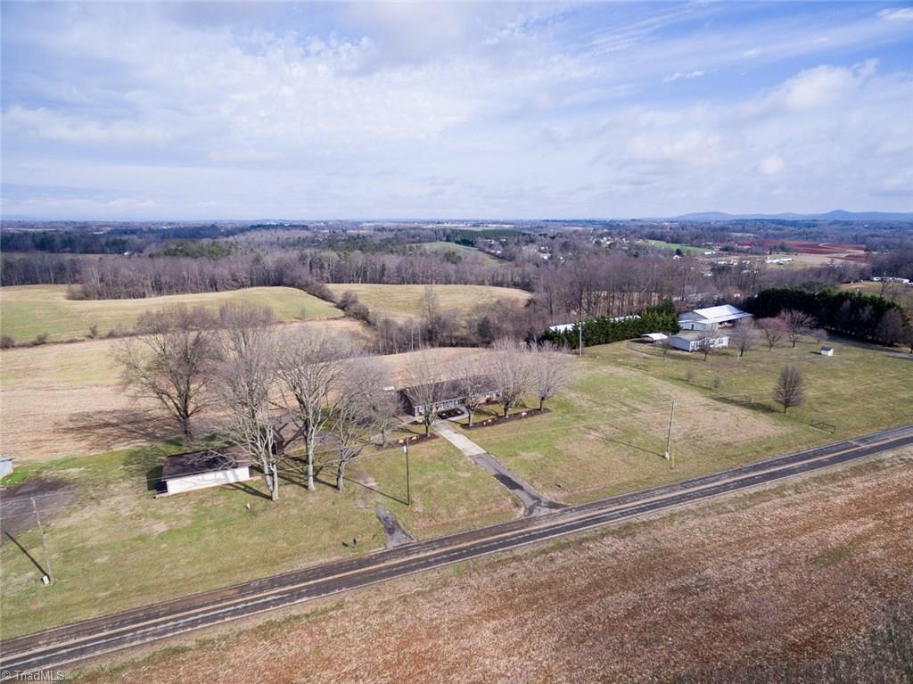 264 Welcome View Church Road Dobson, NC 27017 - Photo 27 of 30 Aerial view of property - home, barn, storage building on 2 acres.