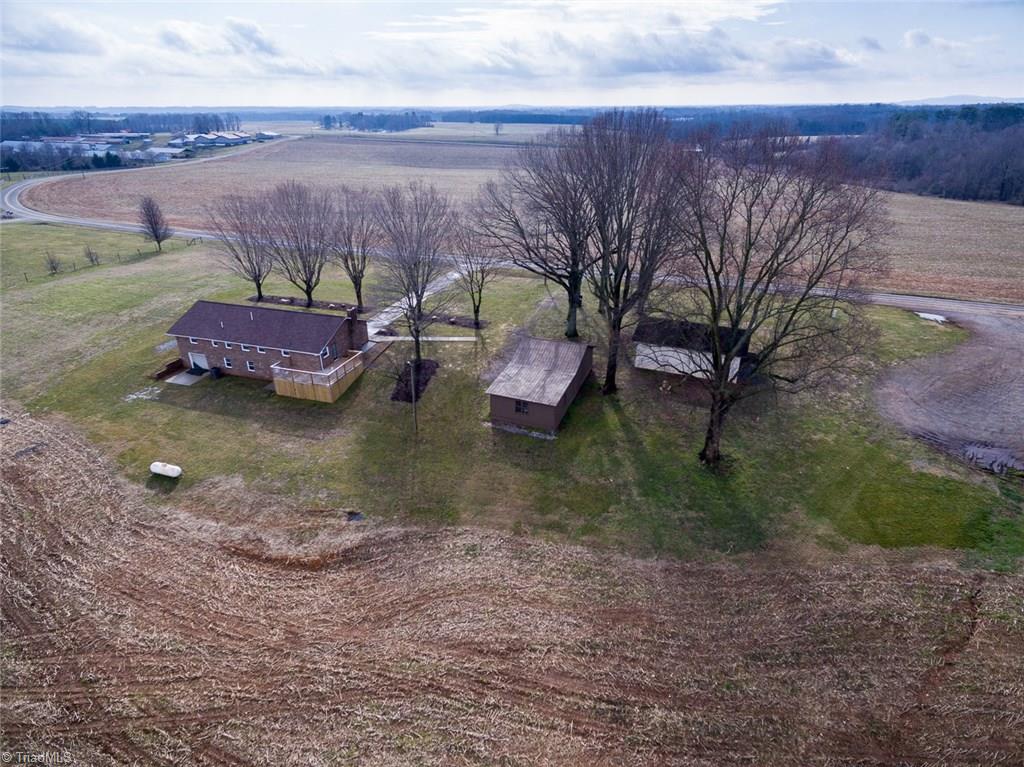 264 Welcome View Church Road Dobson, NC 27017 - Photo 28 of 30 Aerial rear view of property and surrounding country side.