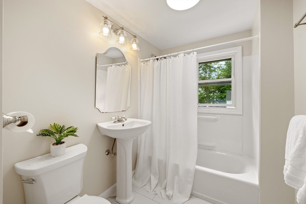 84 New Estate Road Littleton, MA 01460 - Photo 16 of 38 a bathroom with a sink toilet and shower