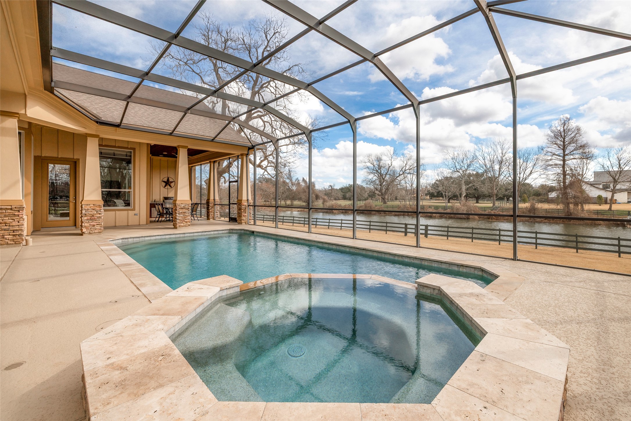 31102 Lower Oxbow Trace Fulshear, TX 77441 - Photo 40 of 50 Fabulous outdoor living with large heated pool & spa with screen porch