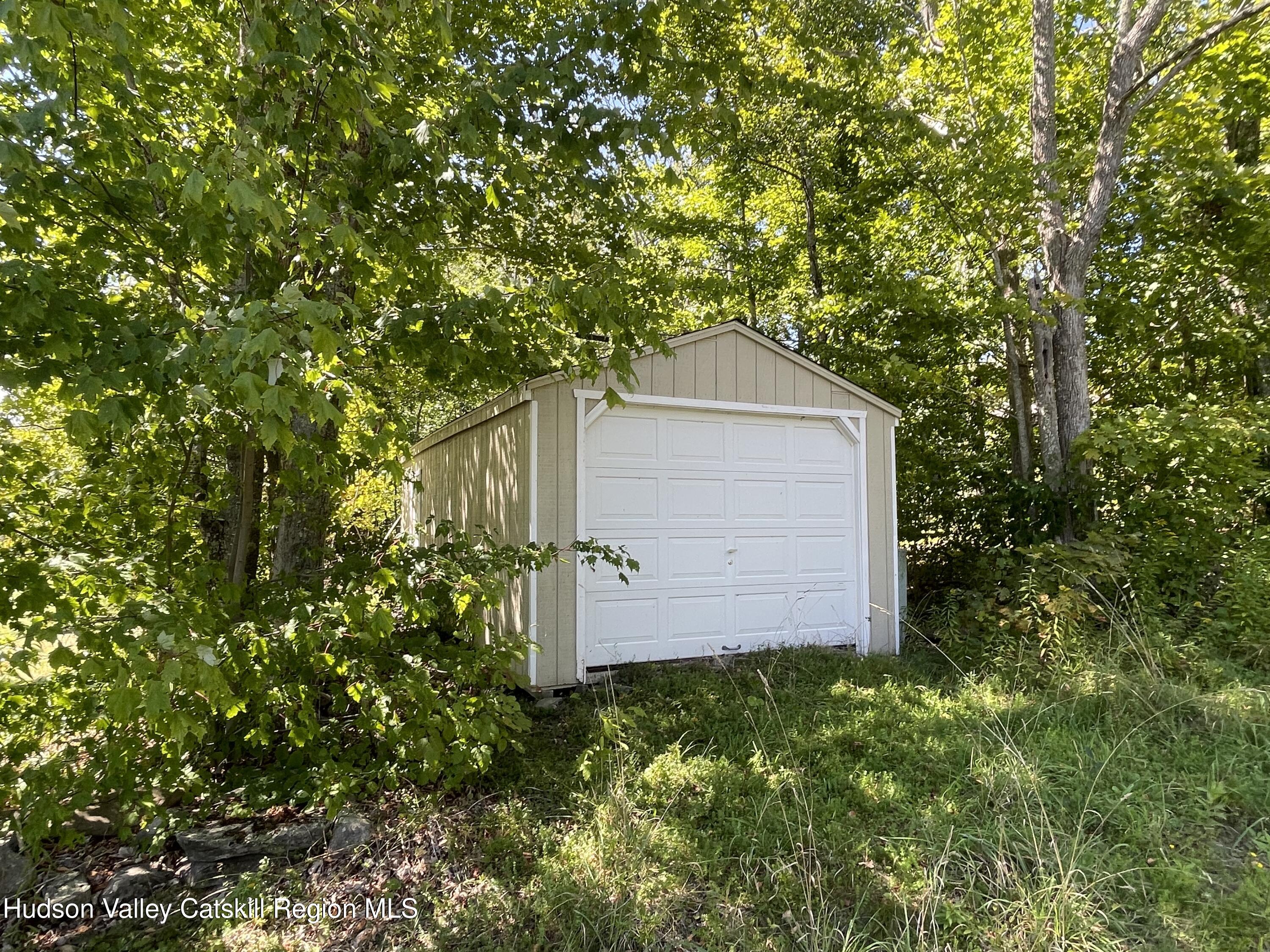 415 Old Road Windham, NY 12496 - Photo 5 of 32 a backyard of a house with lots of green space