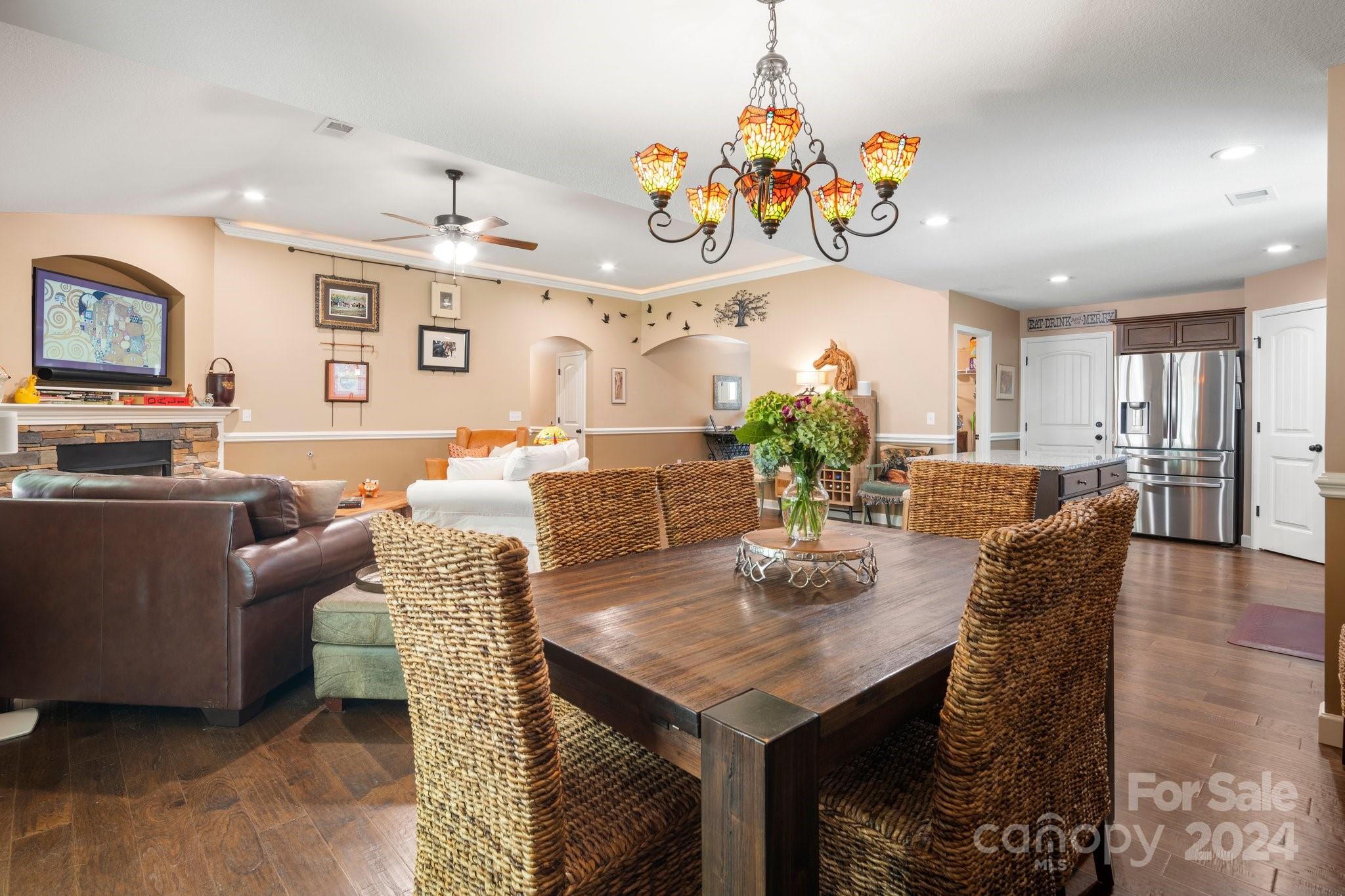262 Renard Road Tryon, NC 28782 - Photo 14 of 31 a view of a dining room with furniture and a chandelier