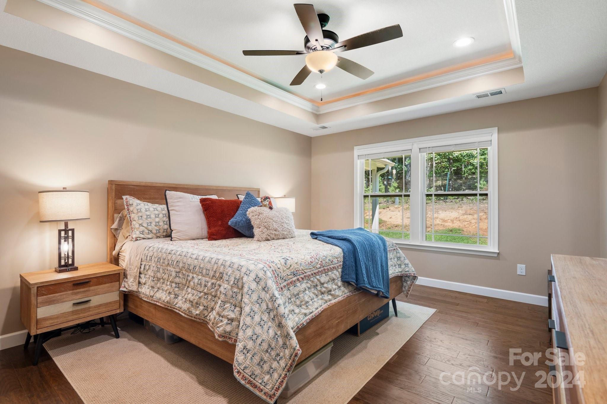 262 Renard Road Tryon, NC 28782 - Photo 18 of 31 a bedroom with a bed and window
