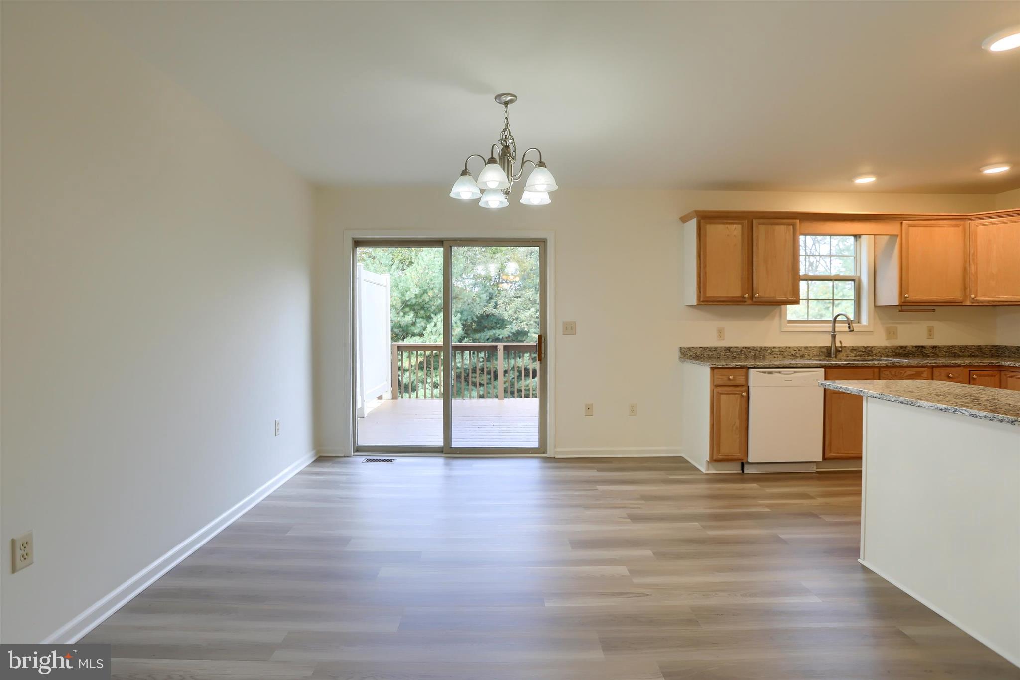 221 West Locust Street Enola, PA 17025 - Photo 11 of 46 a view of a kitchen with wooden floor and a window