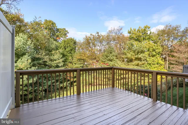 a view of balcony with wooden floor