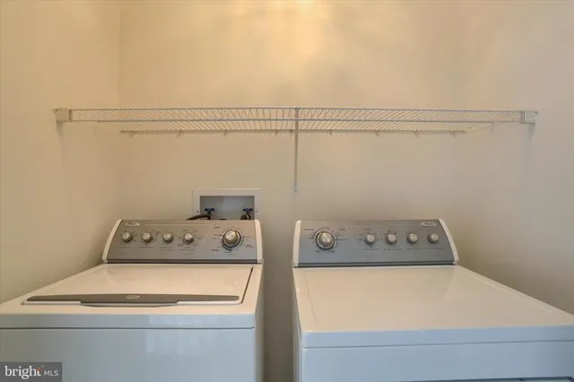 a view of a hallway with staircase