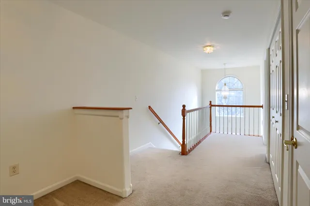 a view of a hallway with entryway