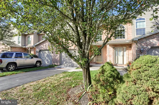 a house view with a garden space