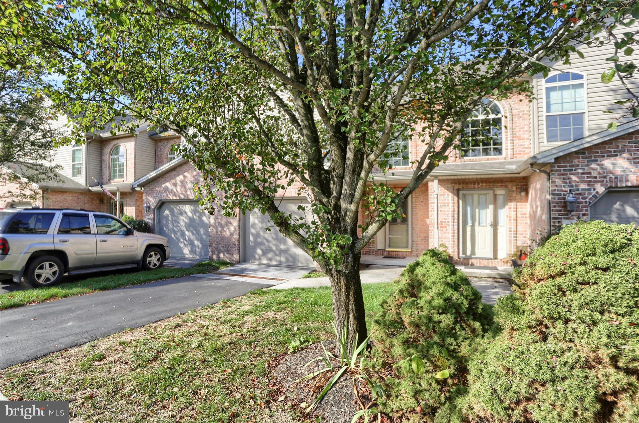 221 West Locust Street Enola, PA 17025 - Photo 4 of 46 a house view with a garden space