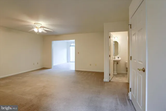 a view of a room with a hallway