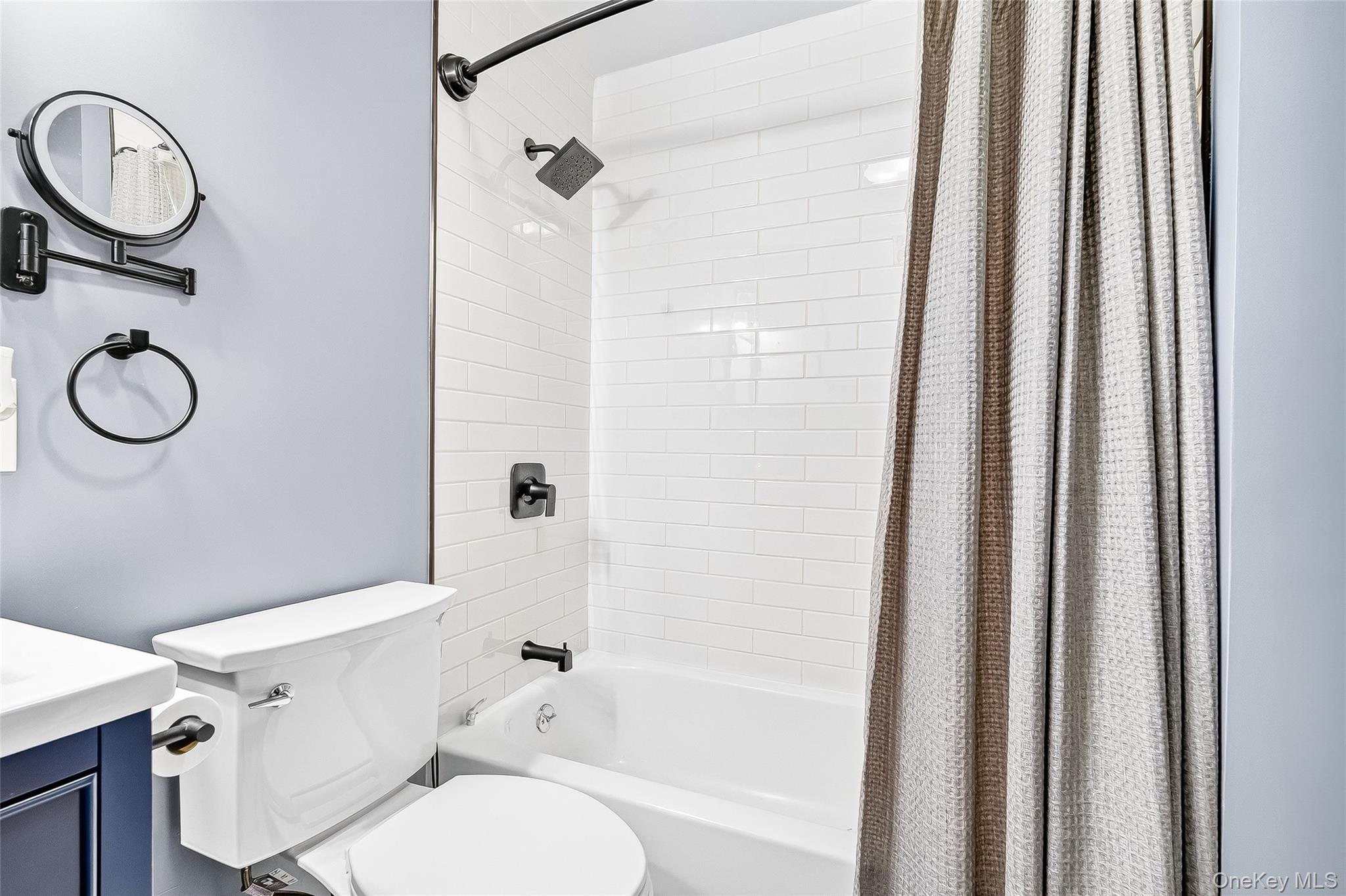 512 High Street Monroe, NY 10950 - Photo 14 of 18 a bathroom with a toilet and a shower