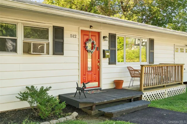 a front view of a house with a porch