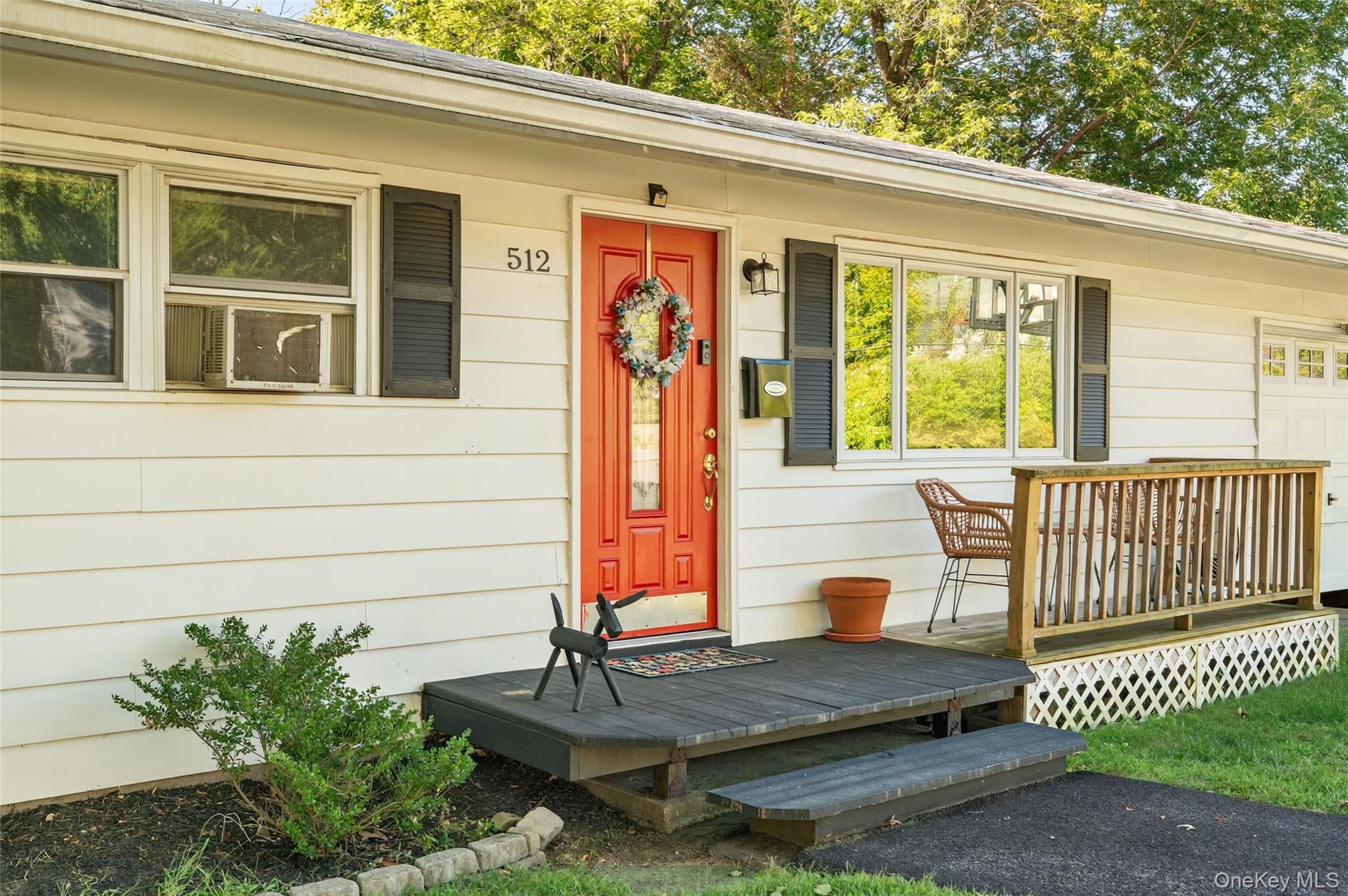 512 High Street Monroe, NY 10950 - Photo 2 of 18 a front view of a house with a porch