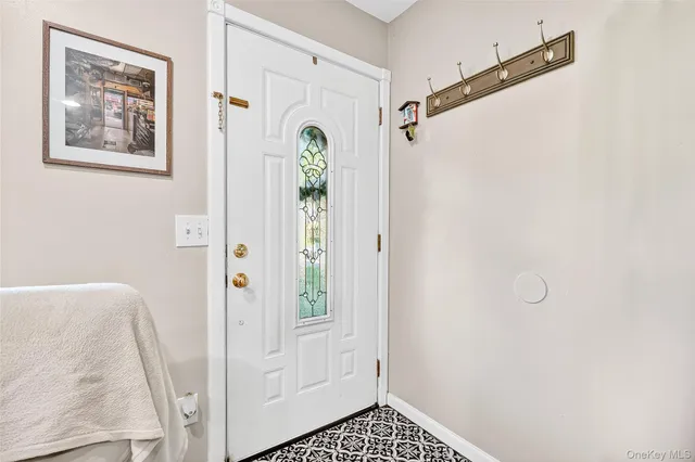a bathroom with a shower and a sink