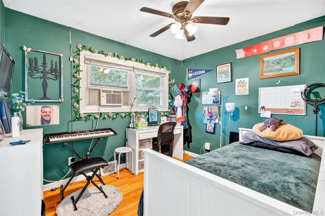 a living room filled with furniture and a chandelier