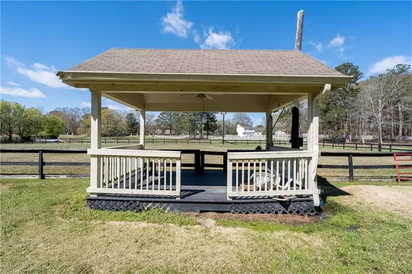 a view of porch with a swing
