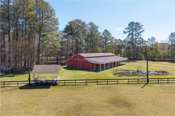 a view of a swimming pool with a chairs