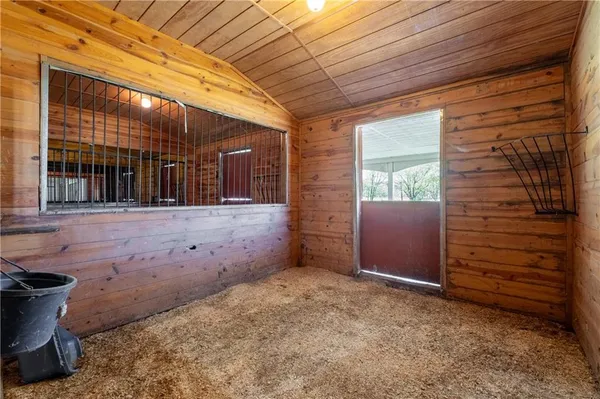 a swimming pool with outdoor seating yard and barbeque oven