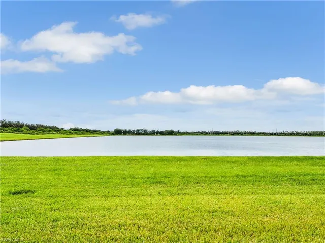a view of a house with porch and furniture