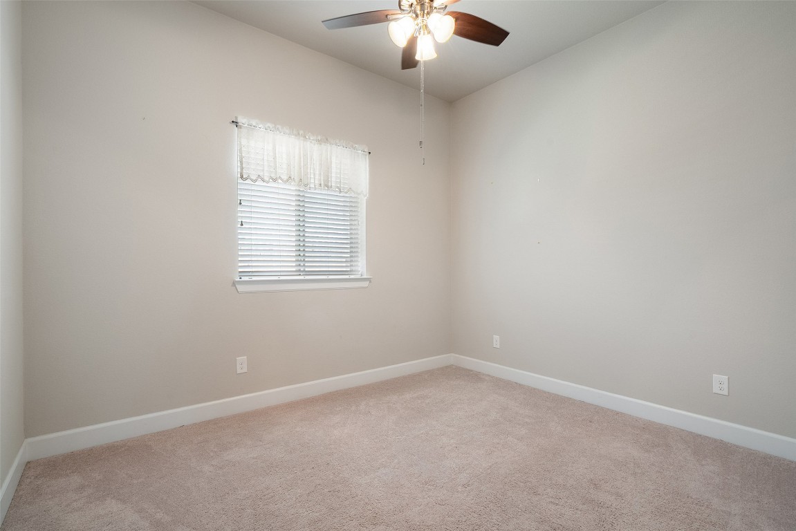 103 Lockhart Loop Georgetown, TX 78628 - Photo 25 of 40 an empty room with a window