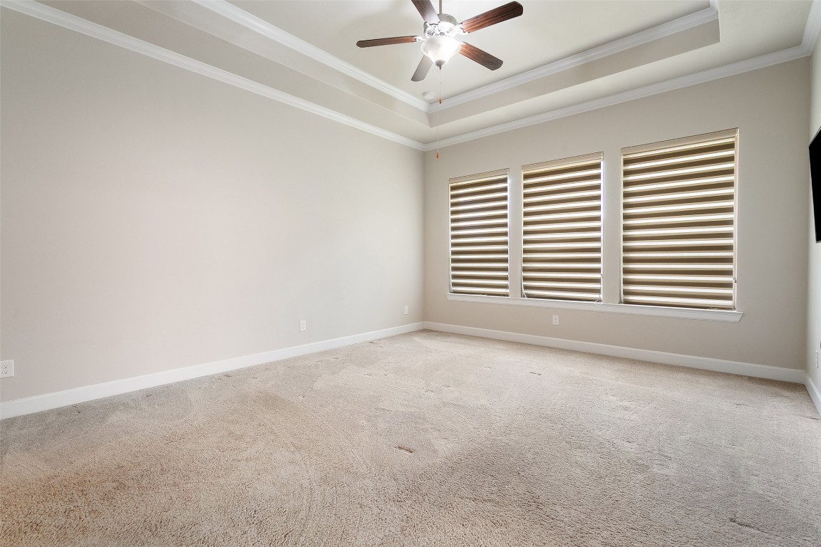 103 Lockhart Loop Georgetown, TX 78628 - Photo 27 of 40 an empty room with a window and a fan