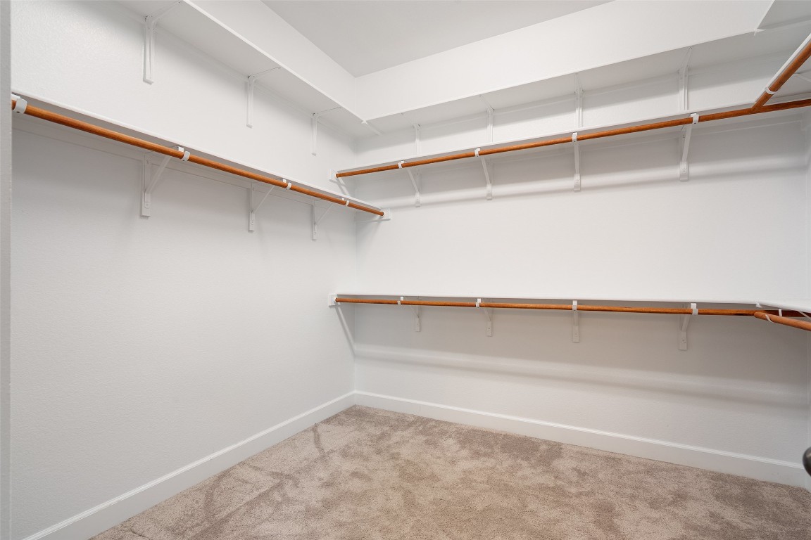103 Lockhart Loop Georgetown, TX 78628 - Photo 33 of 40 a view of an empty walk in closet
