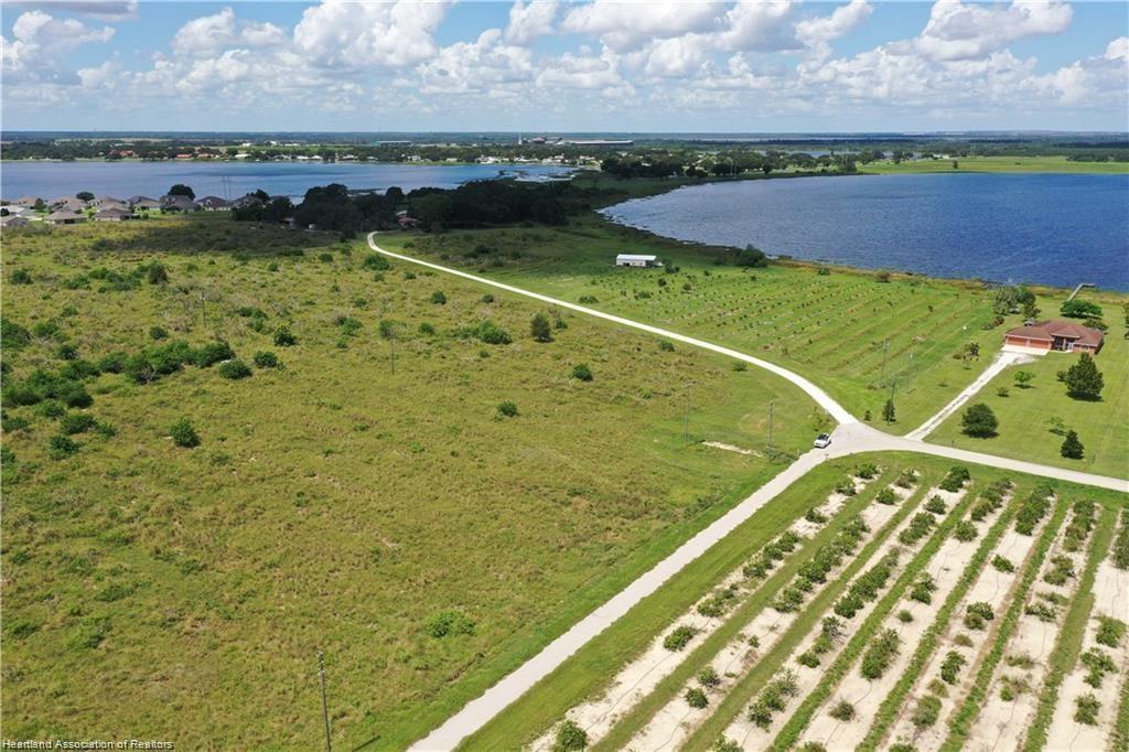 220 East Shockley Road Avon Park, FL 33825 - Photo 2 of 3 a view of a lake with a outdoor space
