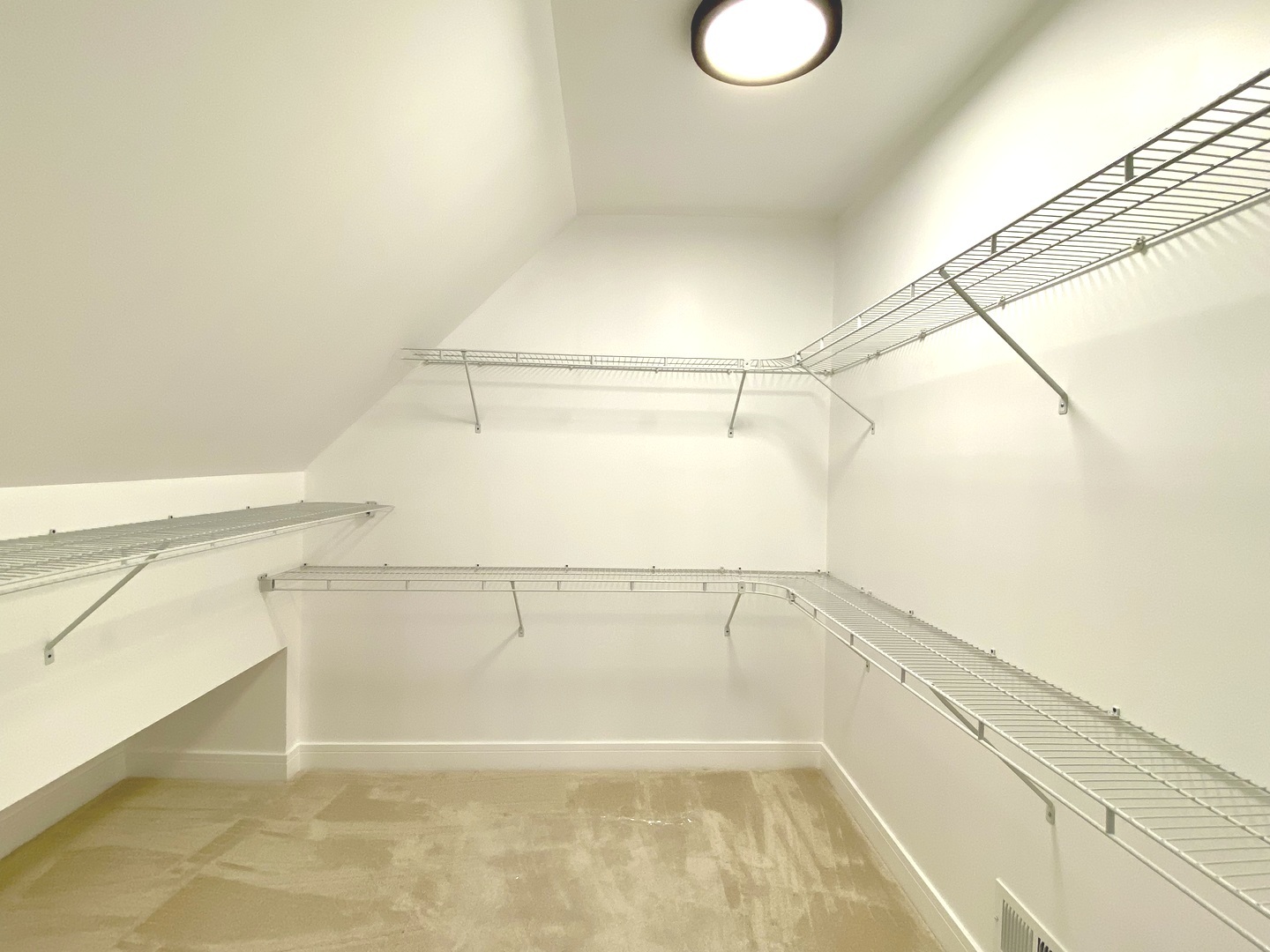 Undisclosed Address Chicago, IL 60619 - Photo 21 of 39 a view of a room with racks on the wall