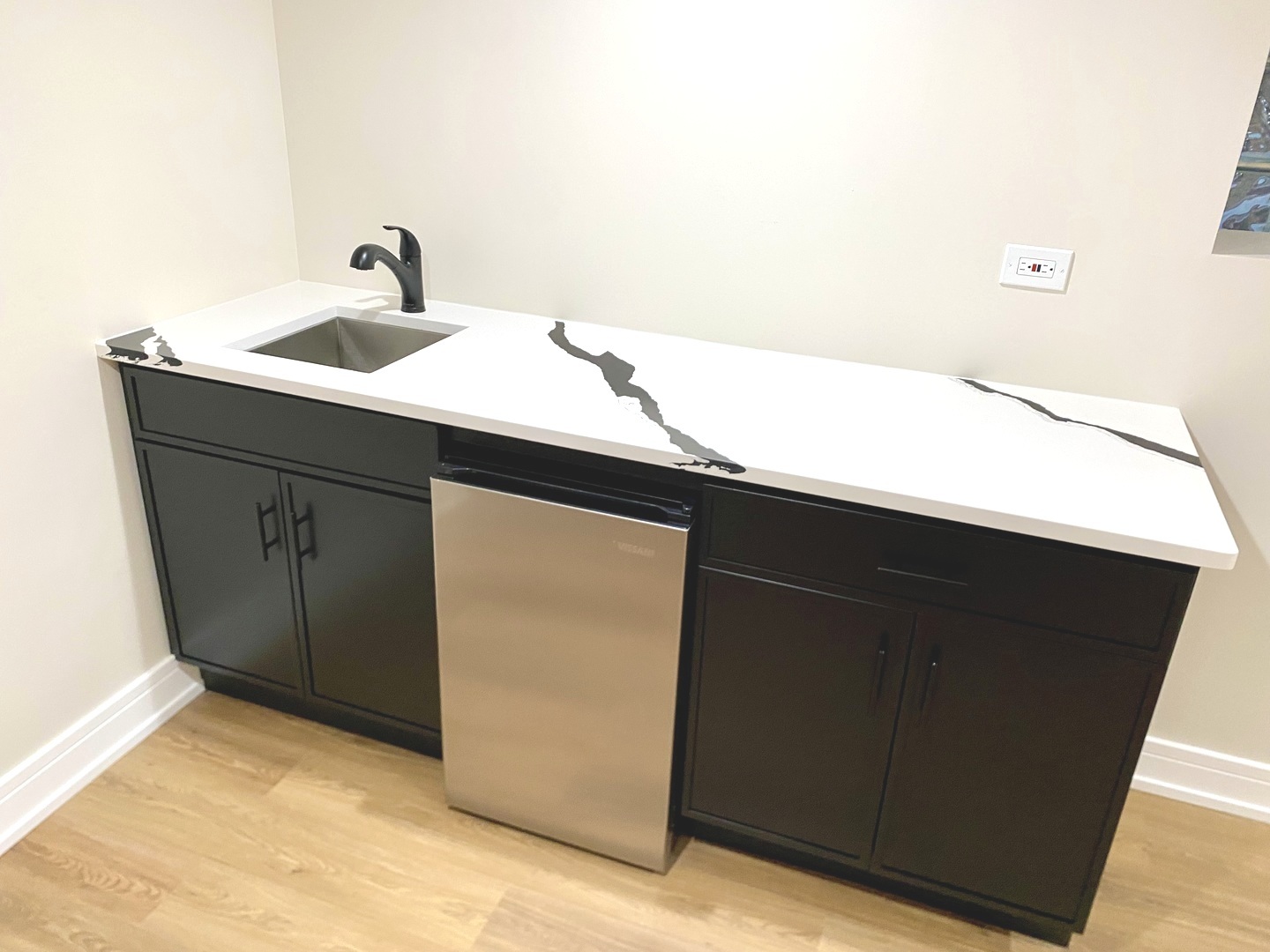 Undisclosed Address Chicago, IL 60619 - Photo 31 of 39 a kitchen with a sink and a mirror