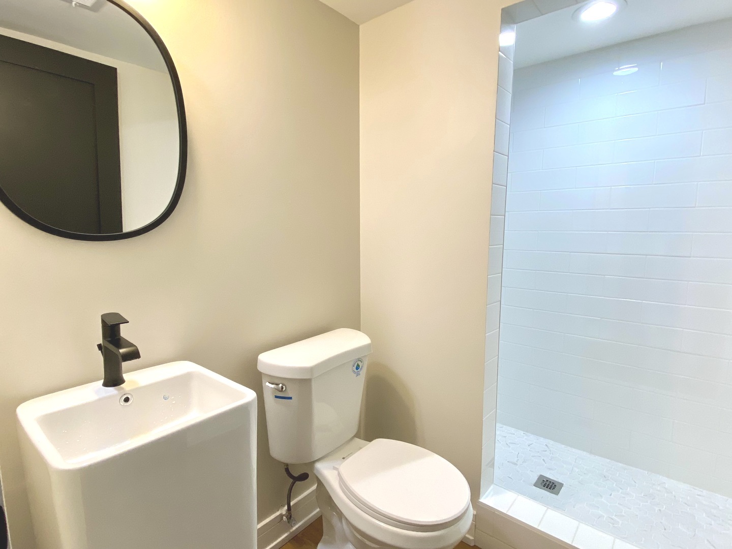 Undisclosed Address Chicago, IL 60619 - Photo 37 of 39 a bathroom with a toilet and a sink