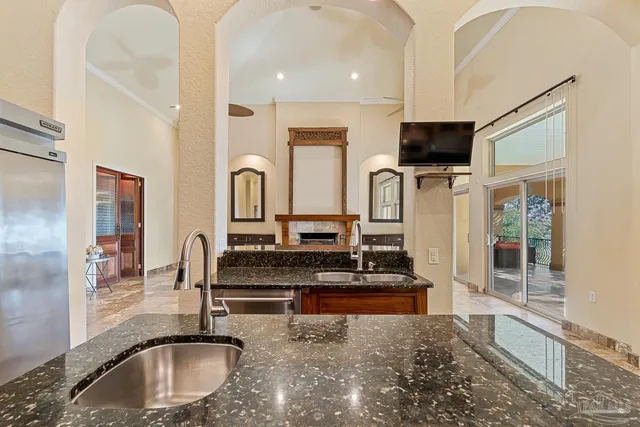 a bathroom with a toilet a sink and a mirror