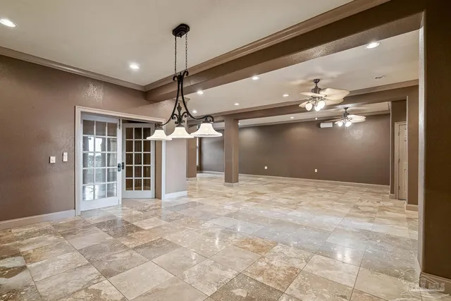 an aerial view of a house with a lake view