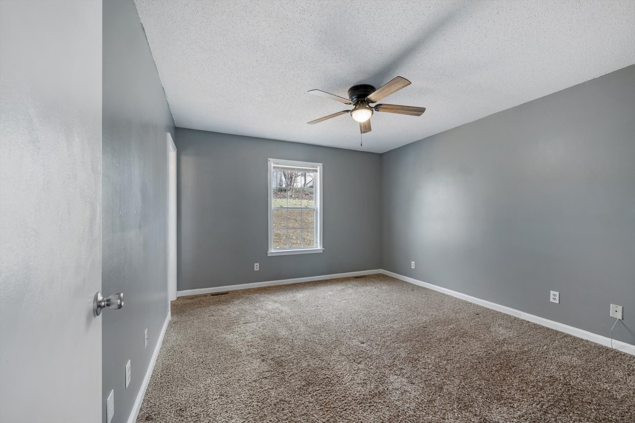 1007 Granny White Road Clarksville, TN 37040 - Photo 21 of 27 a view of an empty room with a window