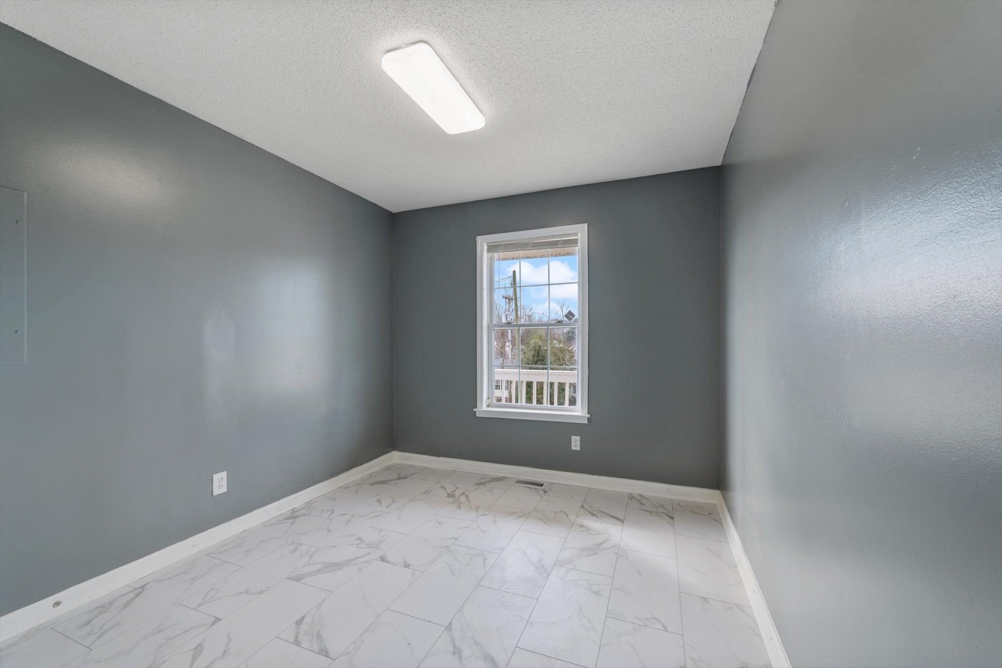 1007 Granny White Road Clarksville, TN 37040 - Photo 25 of 27 a view of an empty room with a window
