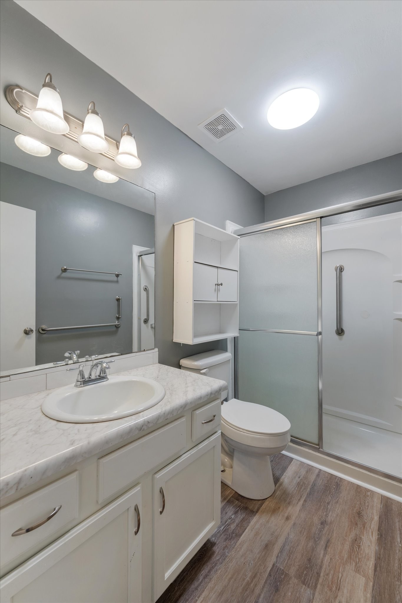 1007 Granny White Road Clarksville, TN 37040 - Photo 26 of 27 a bathroom with a sink toilet and shower