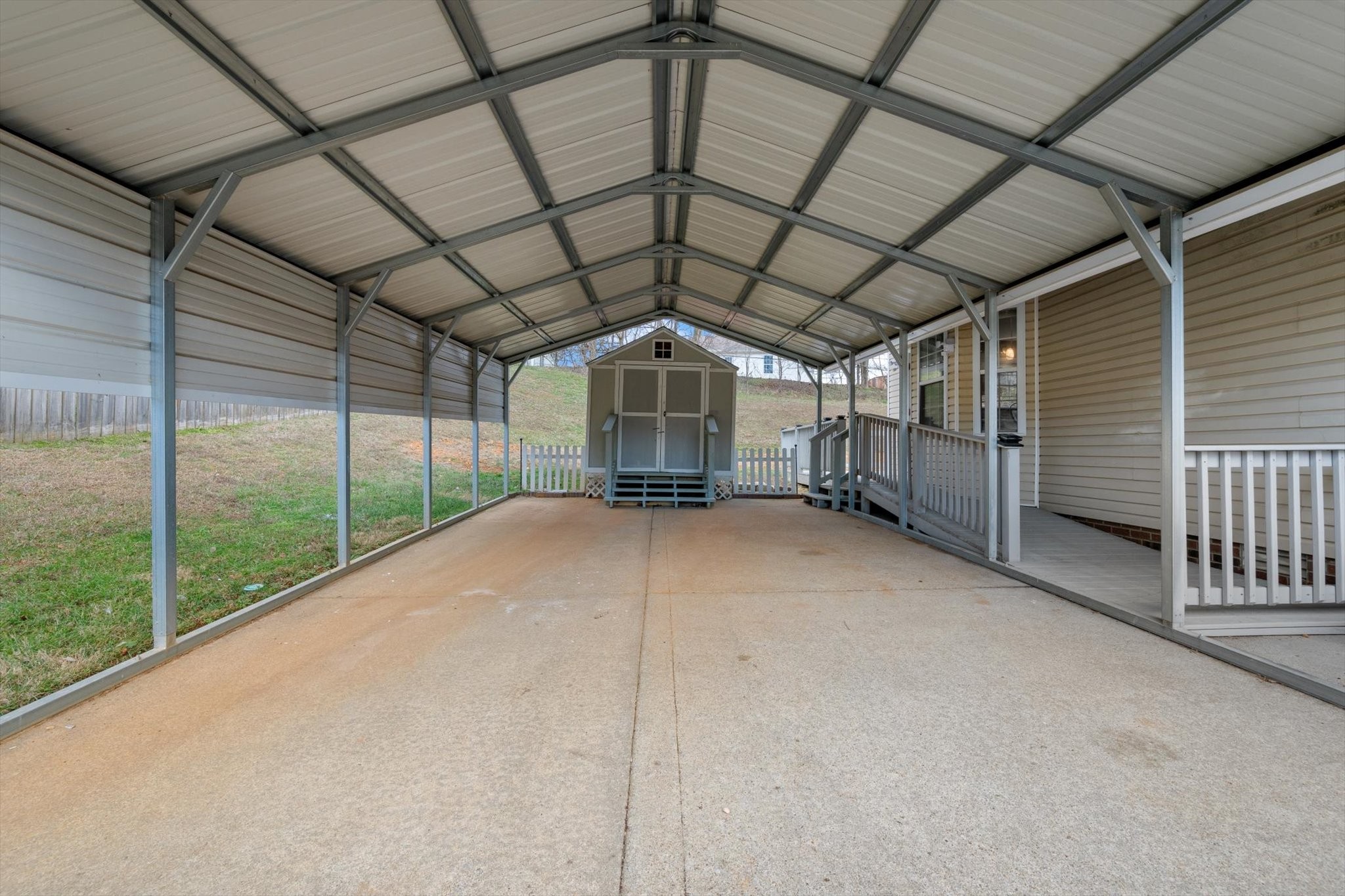 1007 Granny White Road Clarksville, TN 37040 - Photo 9 of 27 a view of a room with wooden walls